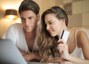 Couple Shopping on Laptop with Credit Card