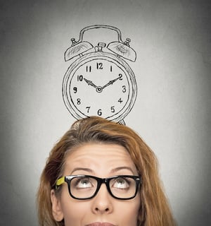 closeup headshot young business woman with alarm clock drawing sketch above her head, isolated grey wall background. Human face expressions, emotions. Time, punctuality, busy schedule concept-1