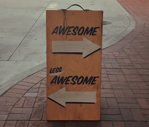 Awesome vs. Less Awesome Sign Board